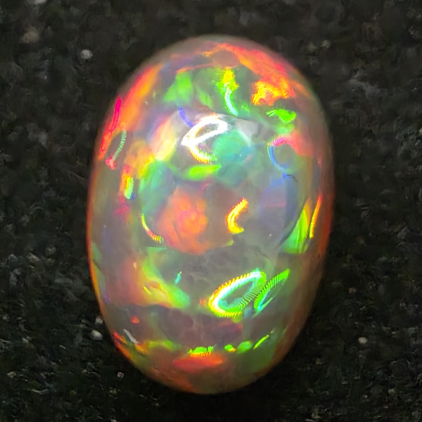 Black Opal special Ethiopian Welo, 6.05 ct oval polished, natural, intense Play-of-Colour