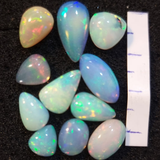 Micro-lot of 11 stones Mixed Opal Ethiopian Welo, 25.4 ct oval polished, natural