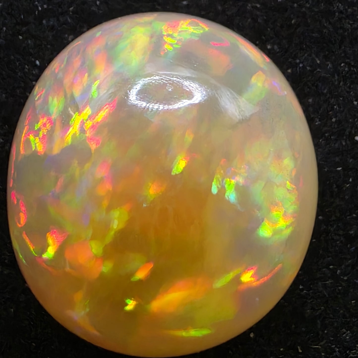 Honey Opal special Ethiopian Welo, 15 ct oval polished, natural