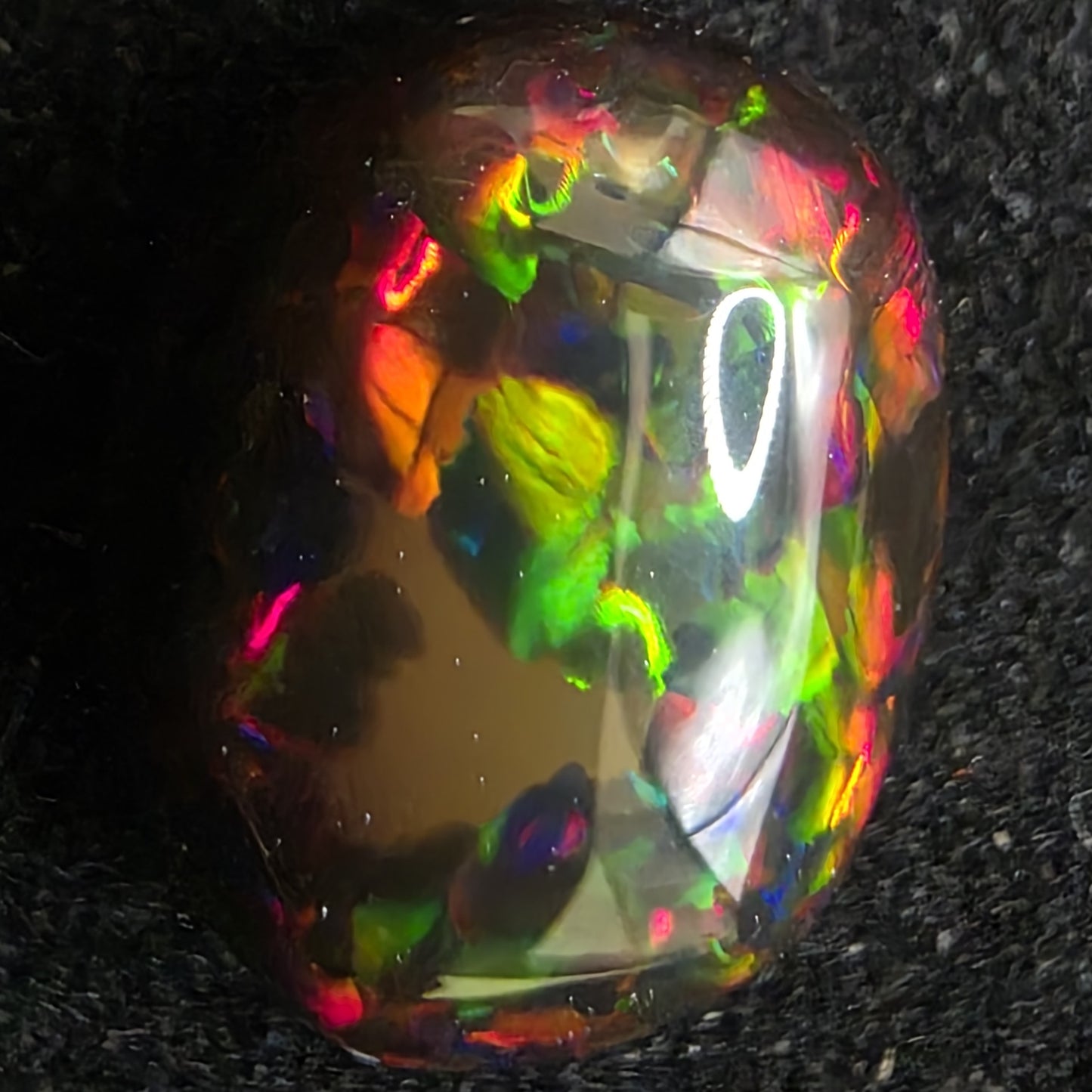 Black Opal special Ethiopian Welo, 4.6 ct oval polished, natural, intense Play-of-Colour
