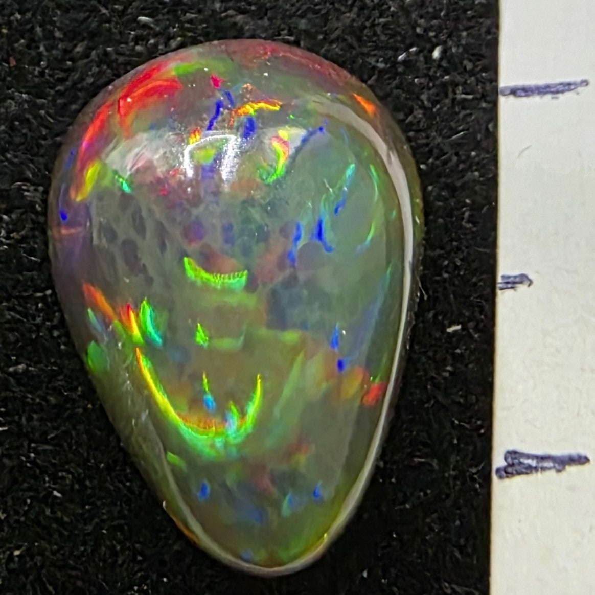 Black Opal special Ethiopian Welo, 5 ct pear polished, natural, intense Play-of-Colour
