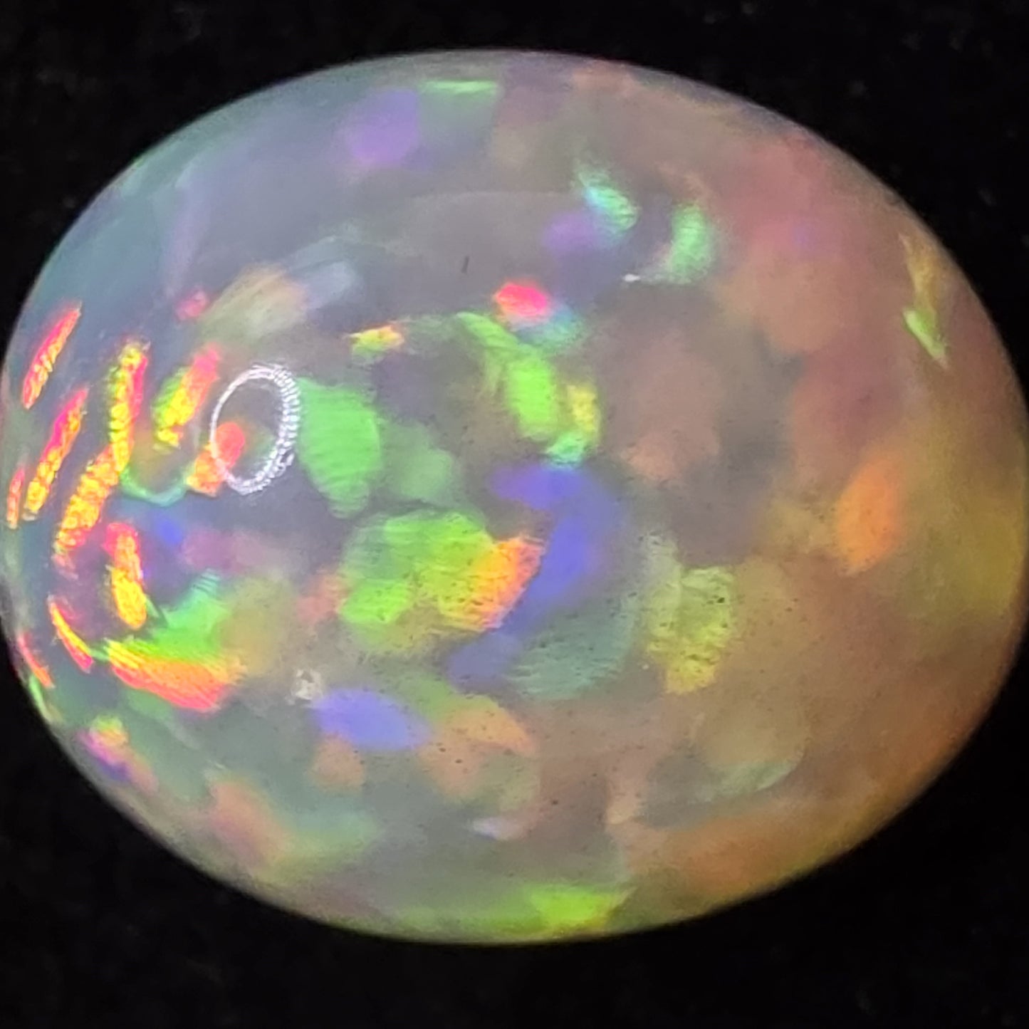 White Opal special Ethiopian Welo, 10.45 ct freeform polished, natural, intense Play-of-Colour