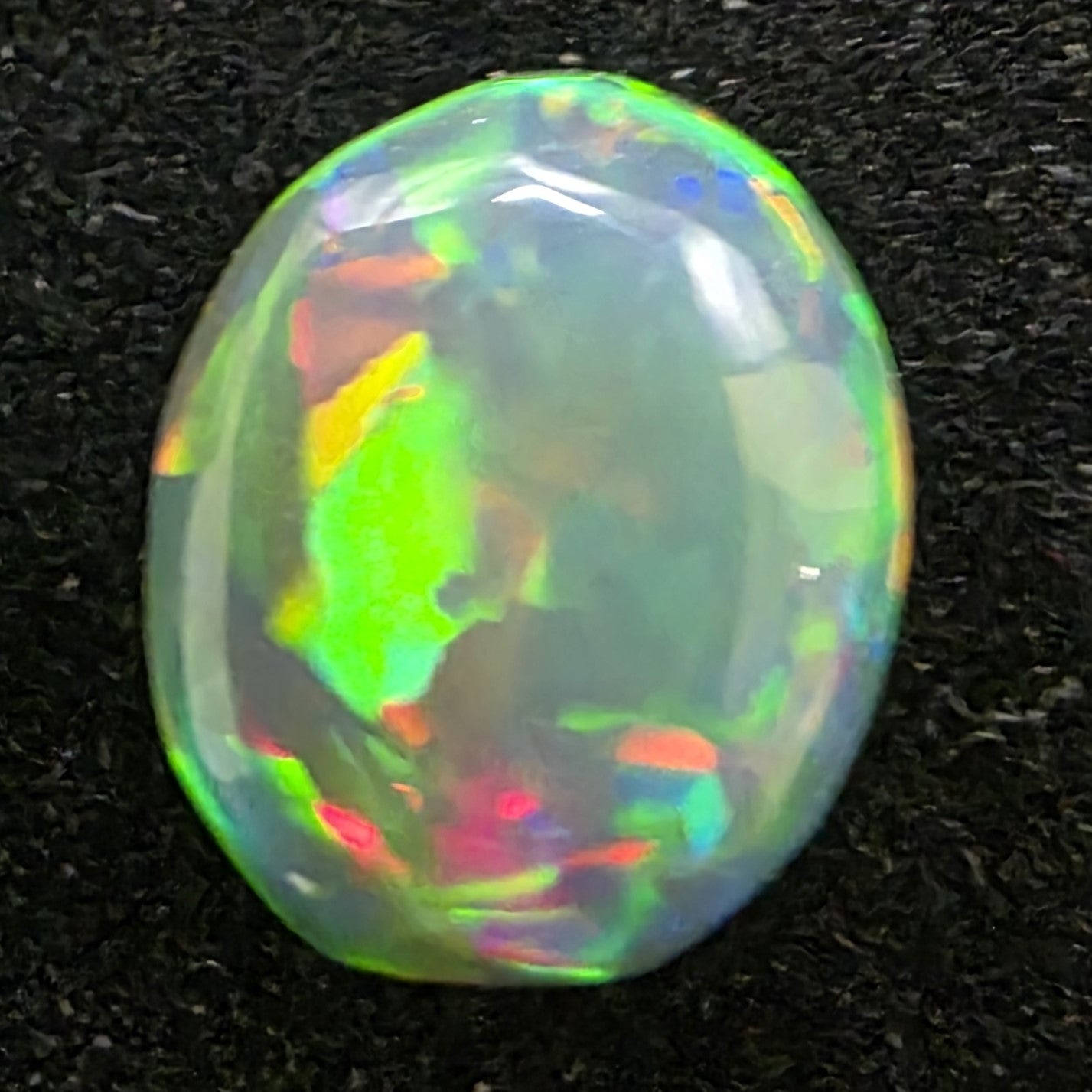 Black Opal special Ethiopian Welo, 1.35 ct oval polished, natural, intense Play-of-Colour