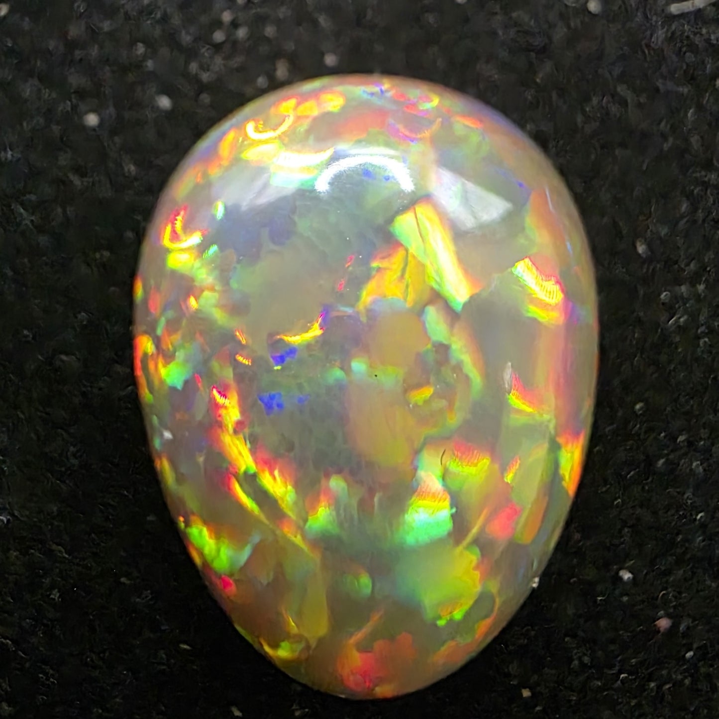 Black Opal special Ethiopian Welo, 5.7 ct pear polished, natural, intense Play-of-Colour