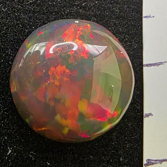 Black Opal special Ethiopian Welo, 4.25 ct round polished, natural, intense Play-of-Colour
