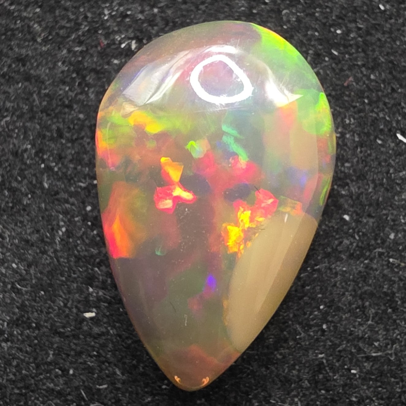 Black Opal special Ethiopian Welo, 2.7 ct pear polished, natural, intense Play-of-Colour