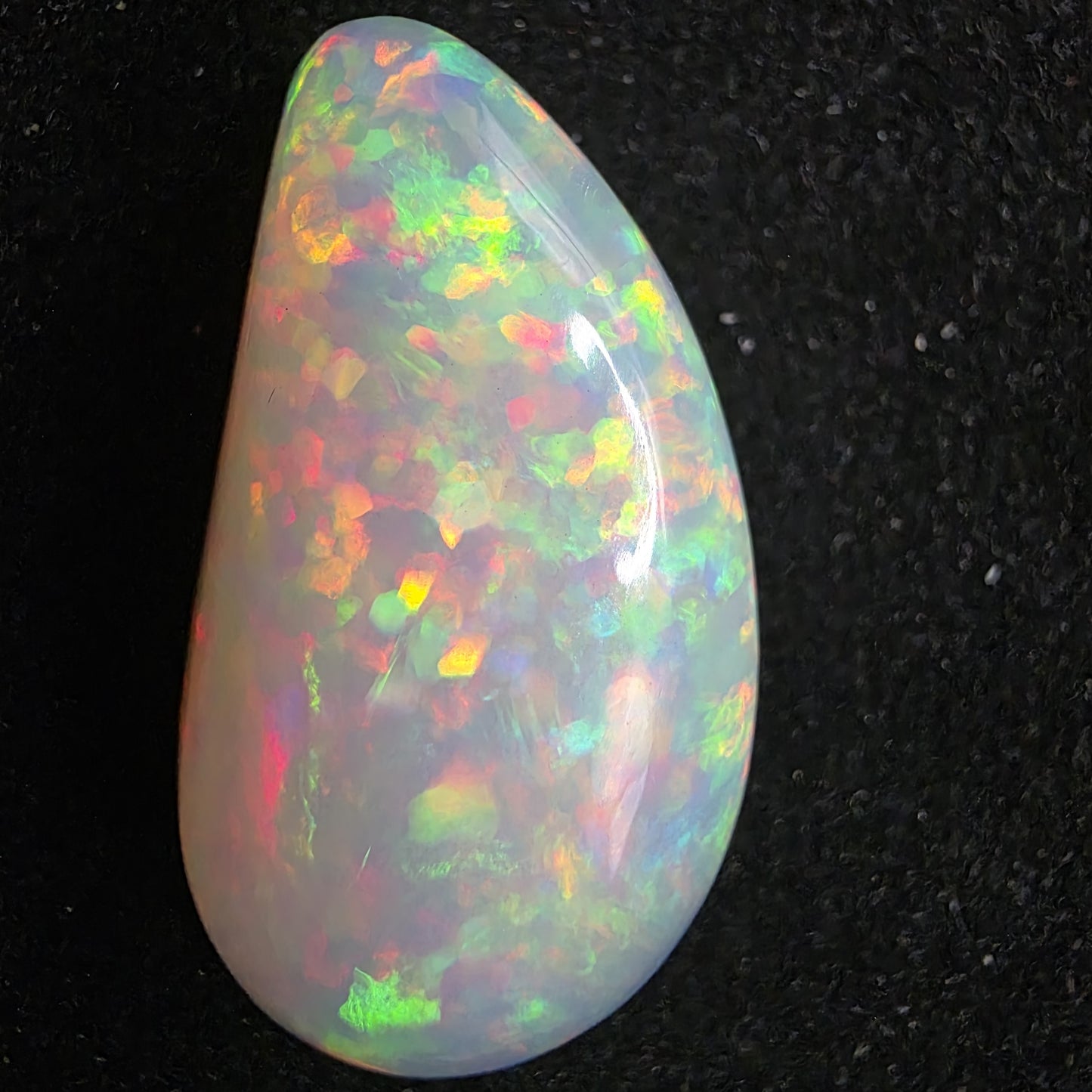 White Opal special Ethiopian Welo, 18.3 ct freeform polished, natural, intense Play-of-Colour