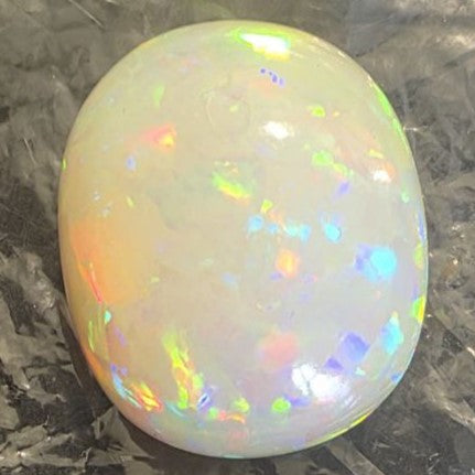 BIG stone! White Opal special Ethiopian Welo, 71.3 ct oval polished, natural, intense Play-of-Colour