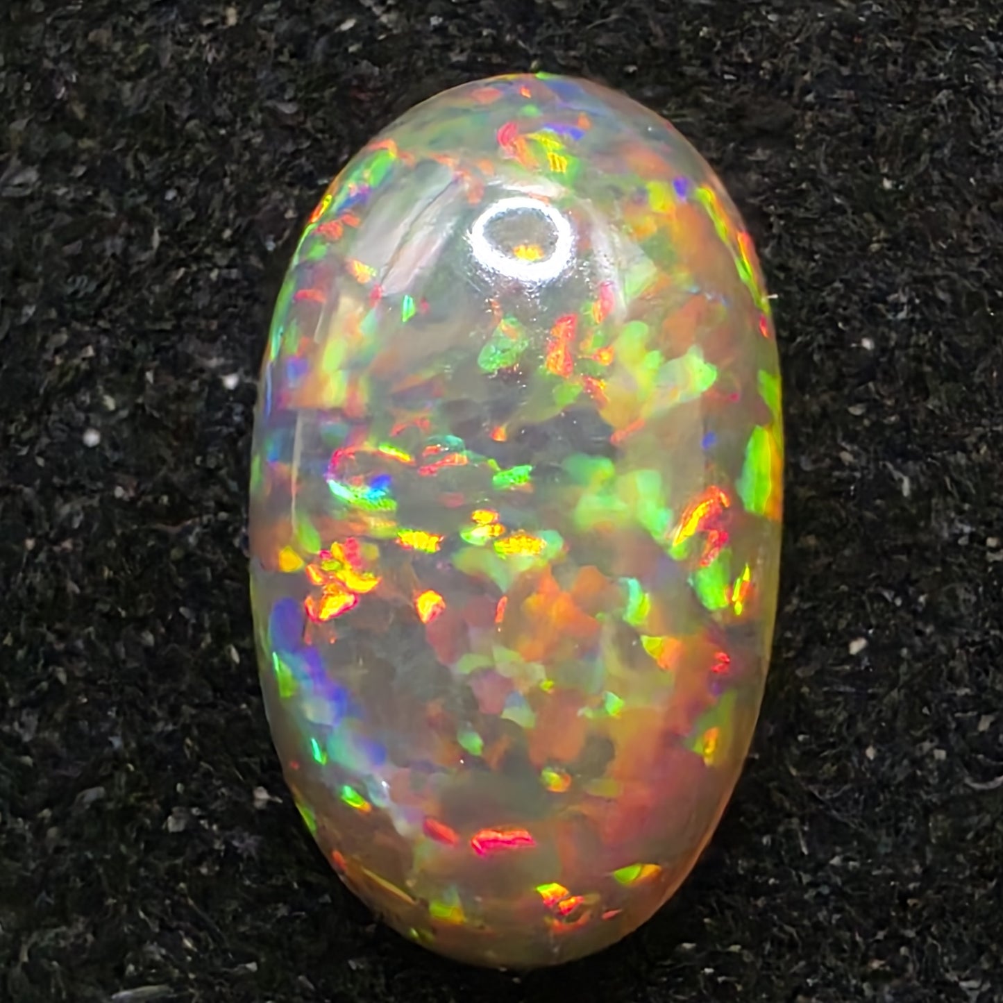 Black Opal special Ethiopian Welo, 3.2 ct oval polished, natural, intense Play-of-Colour