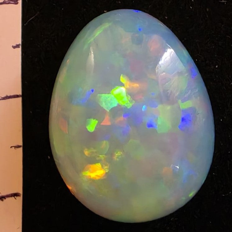 White Opal special Ethiopian Welo, 14.25 ct pear polished, natural, intense Play-of-Colour