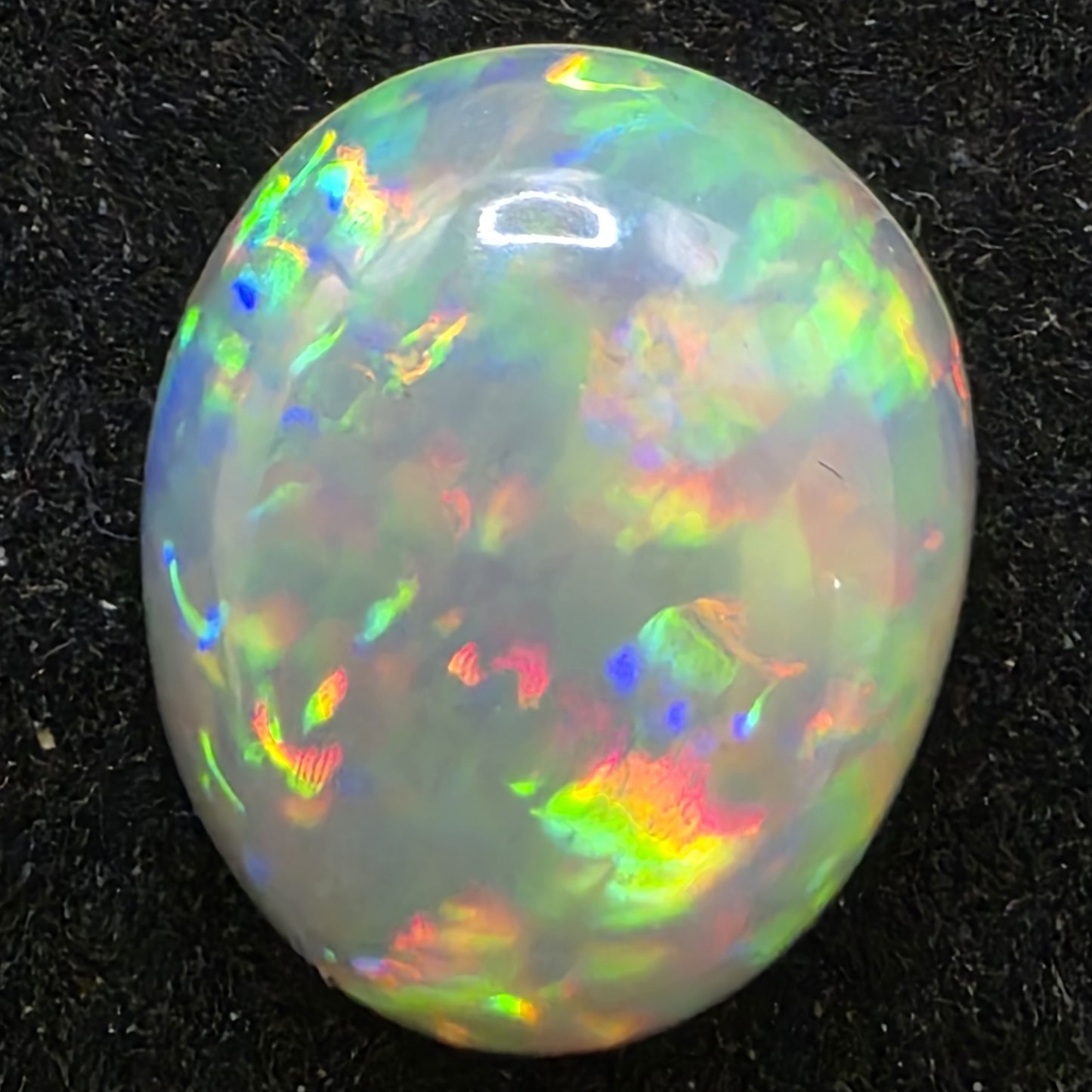 Black Opal special Ethiopian Welo, 3.6 ct oval polished, natural, intense Play-of-Colour