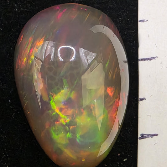 Black Opal special Ethiopian Welo, 18.4 ct pear polished, natural, intense Play-of-Colour