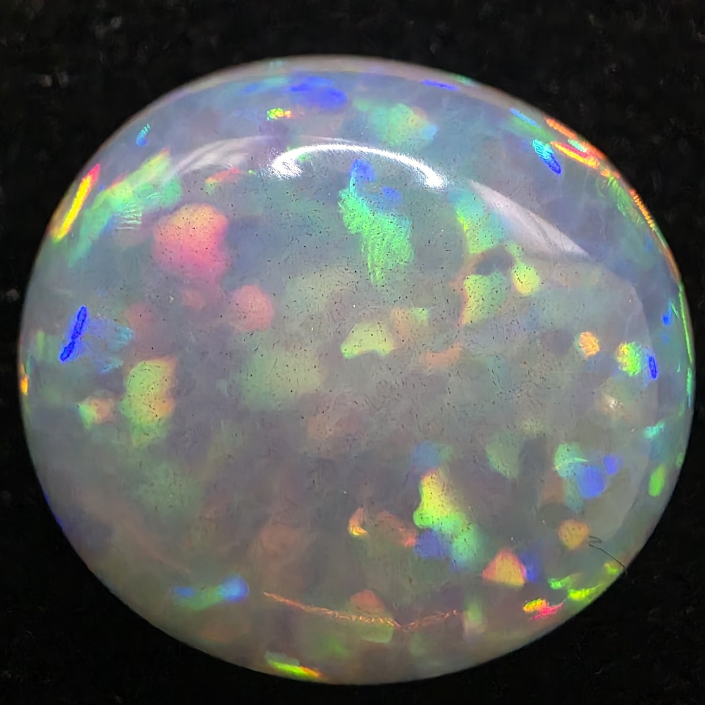 Crystal Opal special Ethiopian Welo, 9.3 ct oval polished, natural