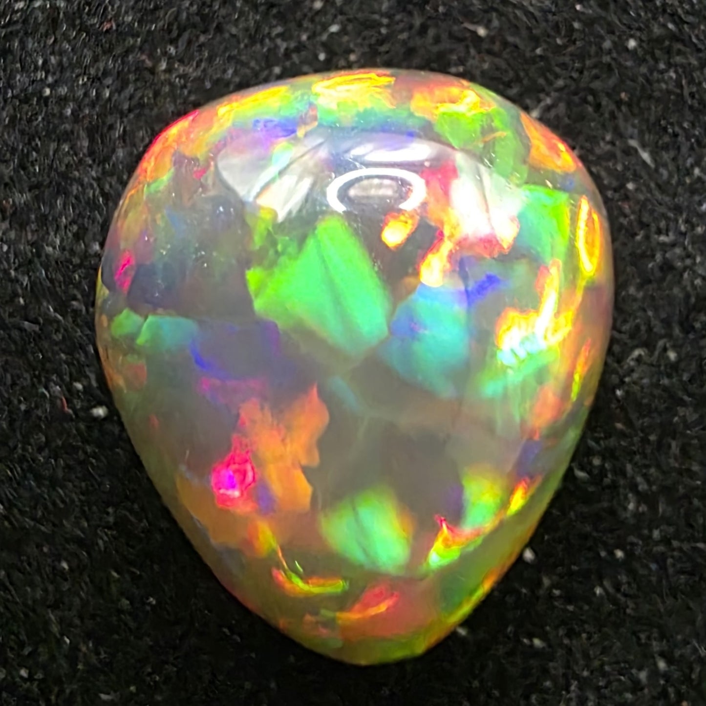Black Opal special Ethiopian Welo, 5.6 ct pear polished, natural, intense Play-of-Colour