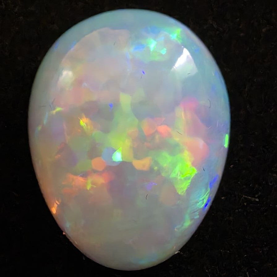 White Opal special Ethiopian Welo, 14.25 ct pear polished, natural, intense Play-of-Colour