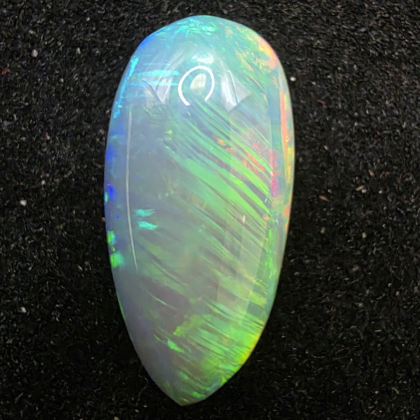 Black Opal special Ethiopian Welo, 5 ct pear polished, natural, intense Play-of-Colour