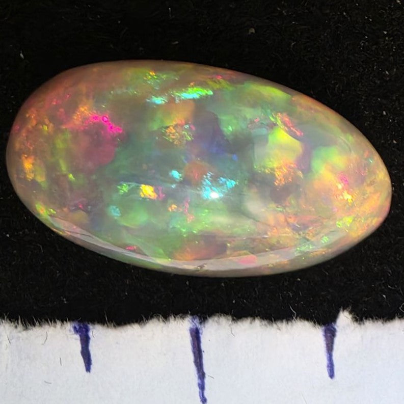 White Opal special Ethiopian Welo, 12.25 ct freeform polished, natural, intense Play-of-Colour