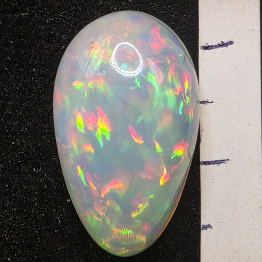 White Opal special Ethiopian Welo, 8.3 ct pear polished, natural, intense Play-of-Colour
