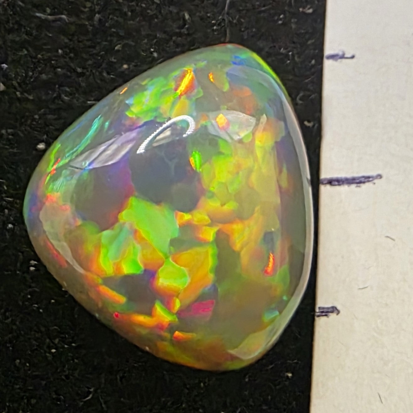 Black Opal special Ethiopian Welo, 4 ct freeform polished, natural, intense Play-of-Colour