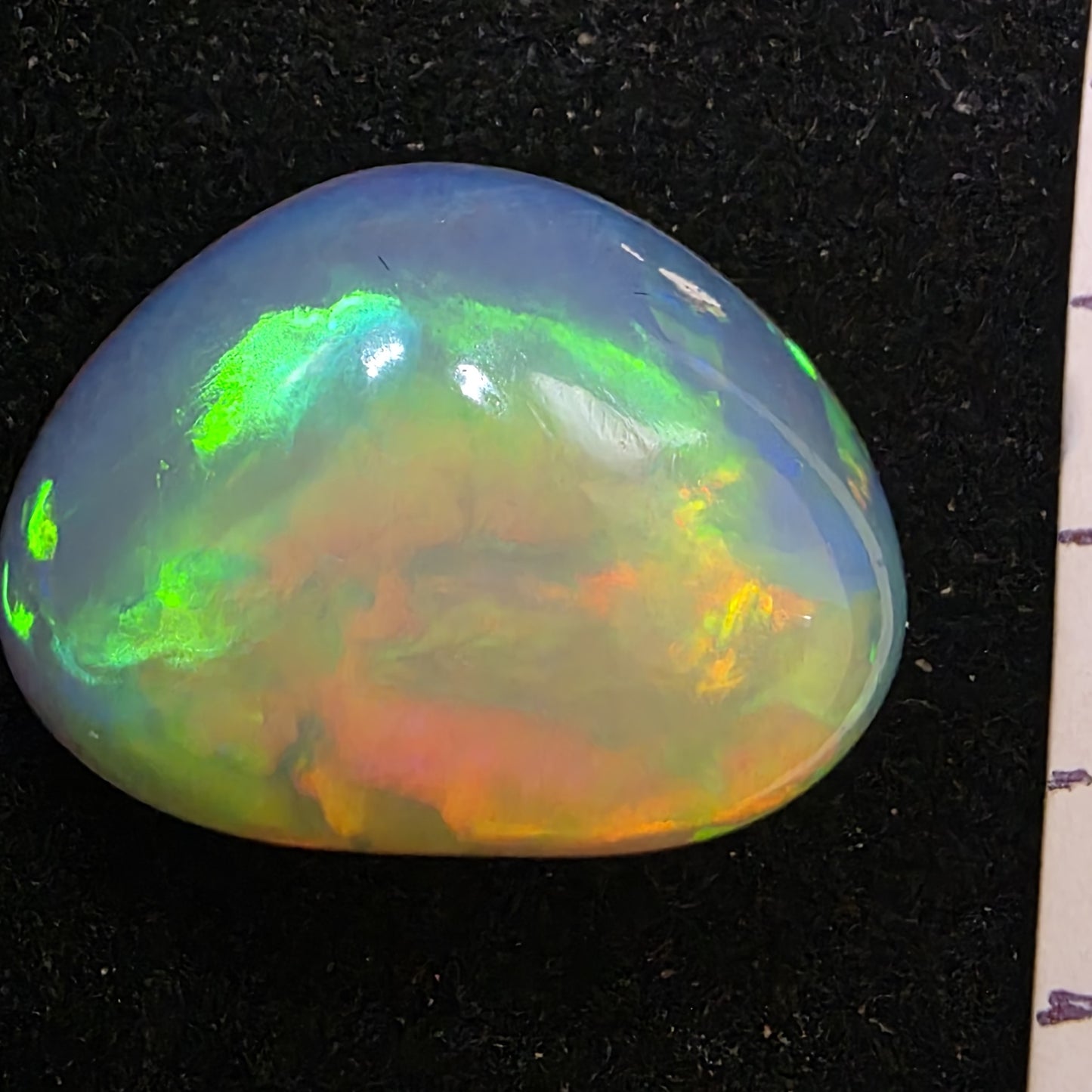 White Opal special Ethiopian Welo, 8.6 ct freeform polished, natural, intense Play-of-Colour