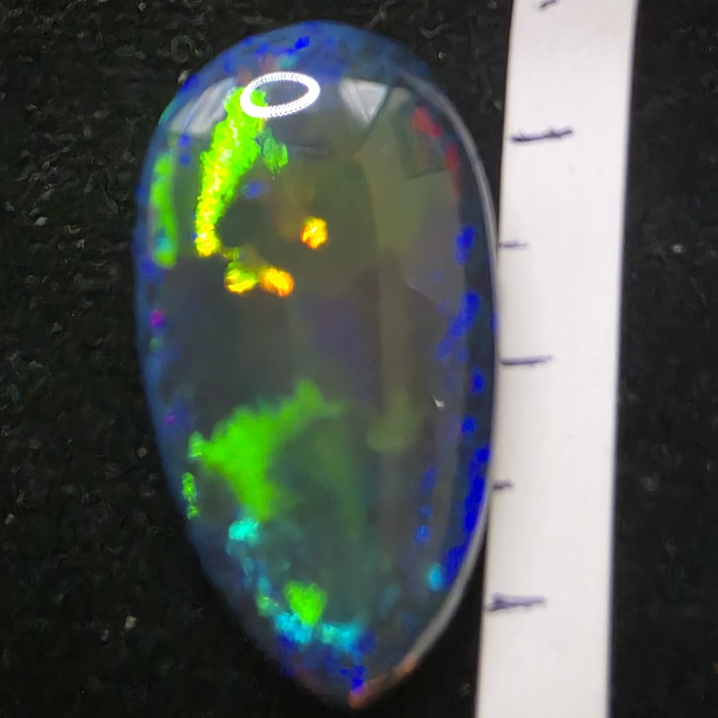 Black Opal special Ethiopian Welo, 17.45 ct pear polished, natural, intense Play-of-Colour