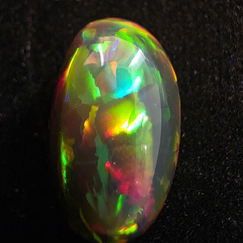 Perfect! Black Opal outstanding Ethiopian Welo, 19.45 ct oval polished, natural, intense Play-of-Colour