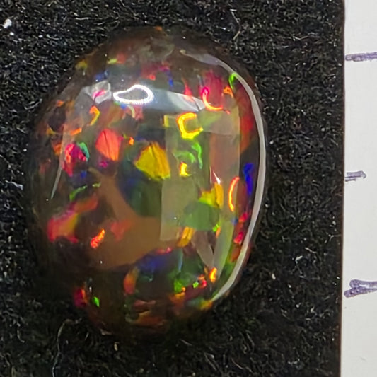 Black Opal special Ethiopian Welo, 4.6 ct oval polished, natural, intense Play-of-Colour