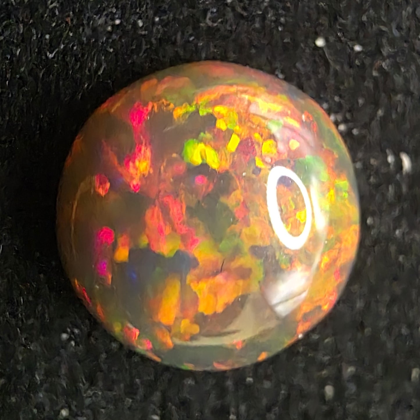 Black Opal special Ethiopian Welo, 4.25 ct round polished, natural, intense Play-of-Colour