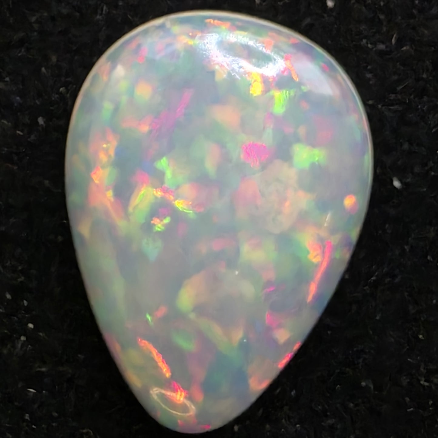 White Opal special Ethiopian Welo, 6.2 ct pear polished, natural, intense Play-of-Colour