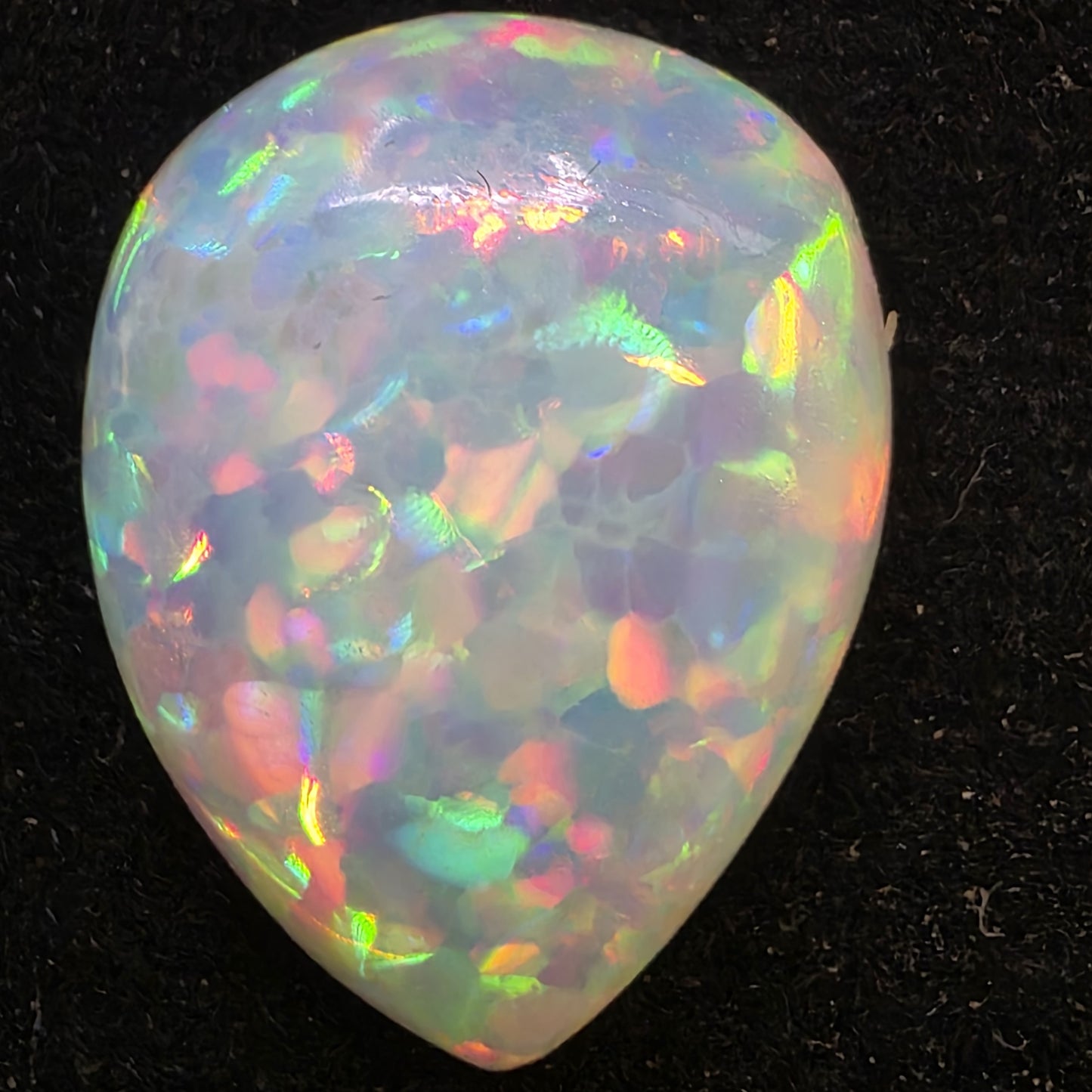 White Opal special Ethiopian Welo, 5.5 ct pear polished, natural, intense Play-of-Colour