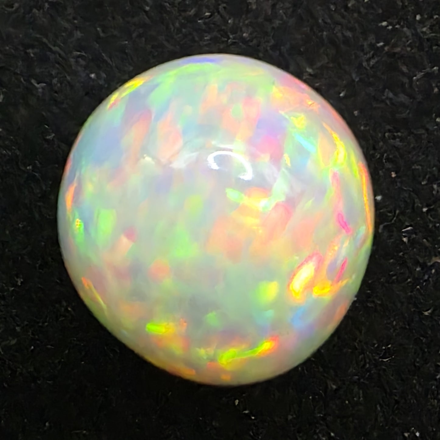 Honeycomb White Opal special Ethiopian Welo, 8.7 ct freeform polished, natural, intense Play-of-Colour