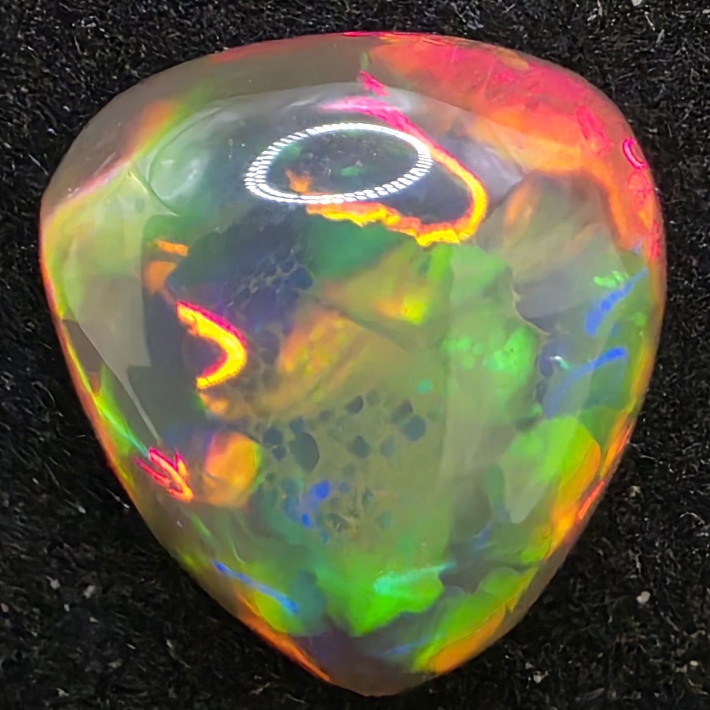 Black Opal special Ethiopian Welo, 4.2 ct pear polished, natural, intense Play-of-Colour
