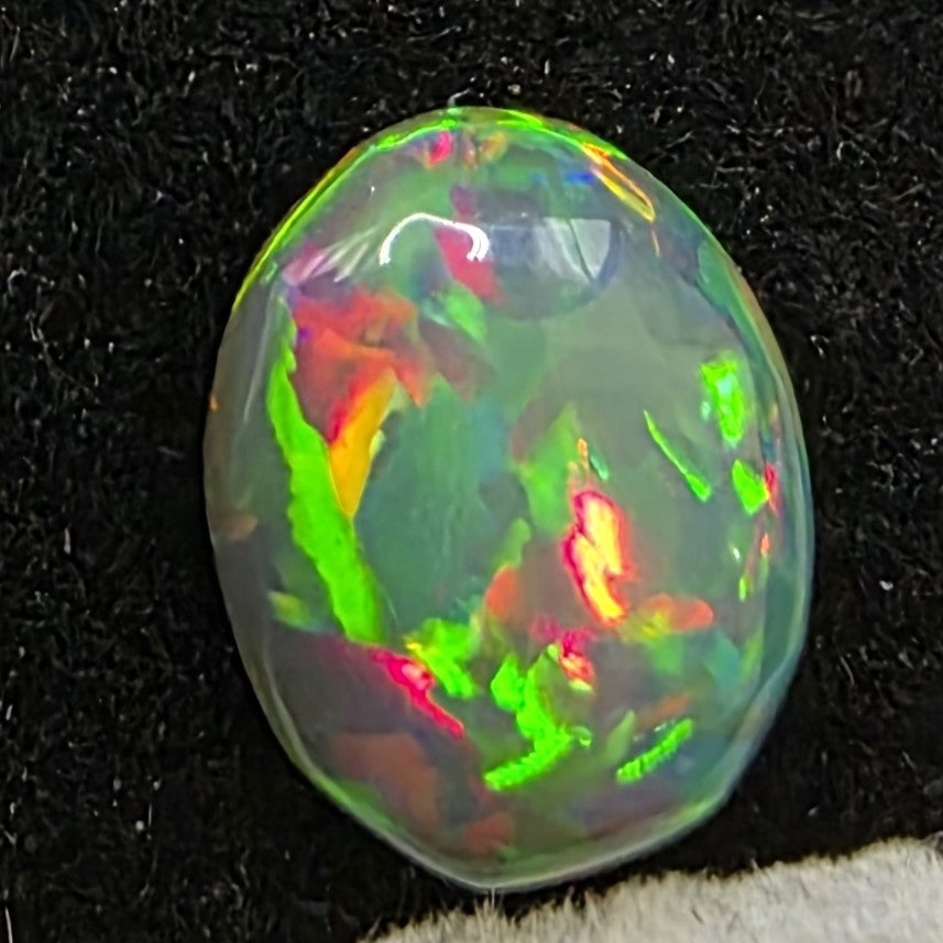 Black Opal special Ethiopian Welo, 1.35 ct oval polished, natural, intense Play-of-Colour