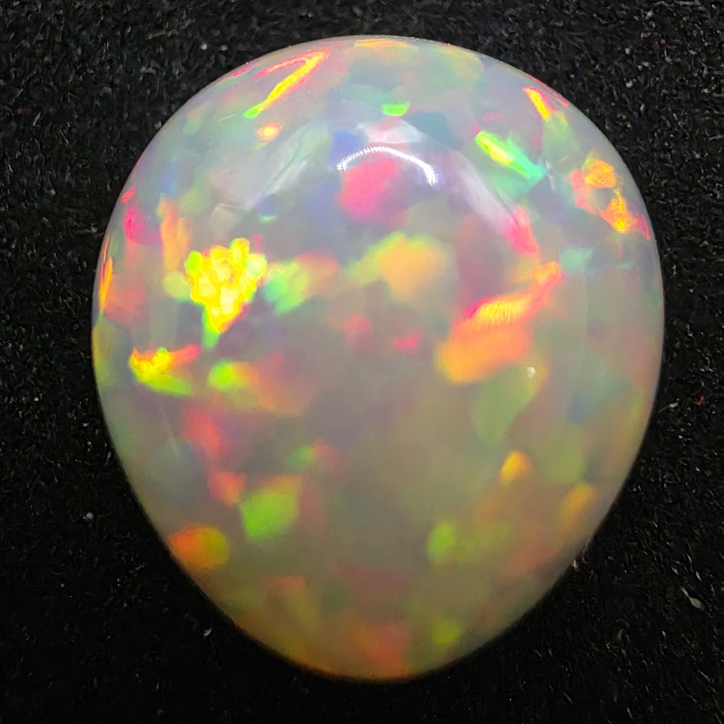 Black Opal special Ethiopian Welo, 5 ct freeform polished, natural, intense Play-of-Colour