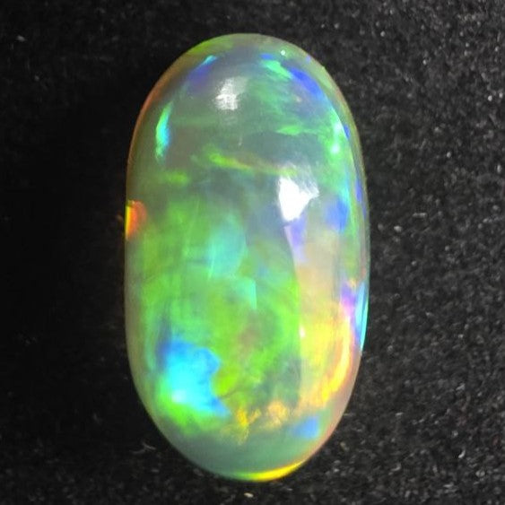 Black Opal special Ethiopian Welo, 4.8 ct oval polished, natural, intense Play-of-Colour