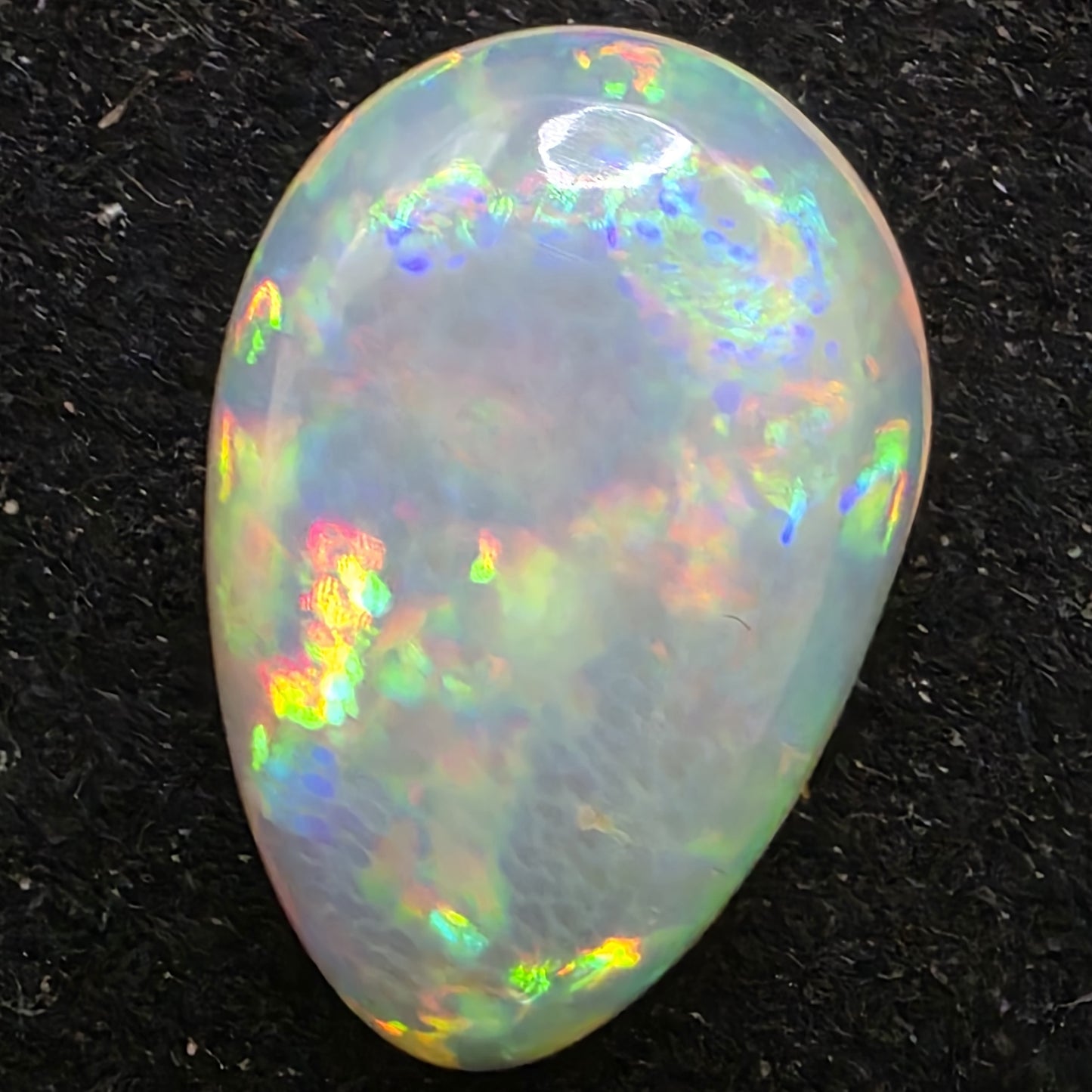 White Opal special Ethiopian Welo, 8.5 ct pear polished, natural, intense Play-of-Colour