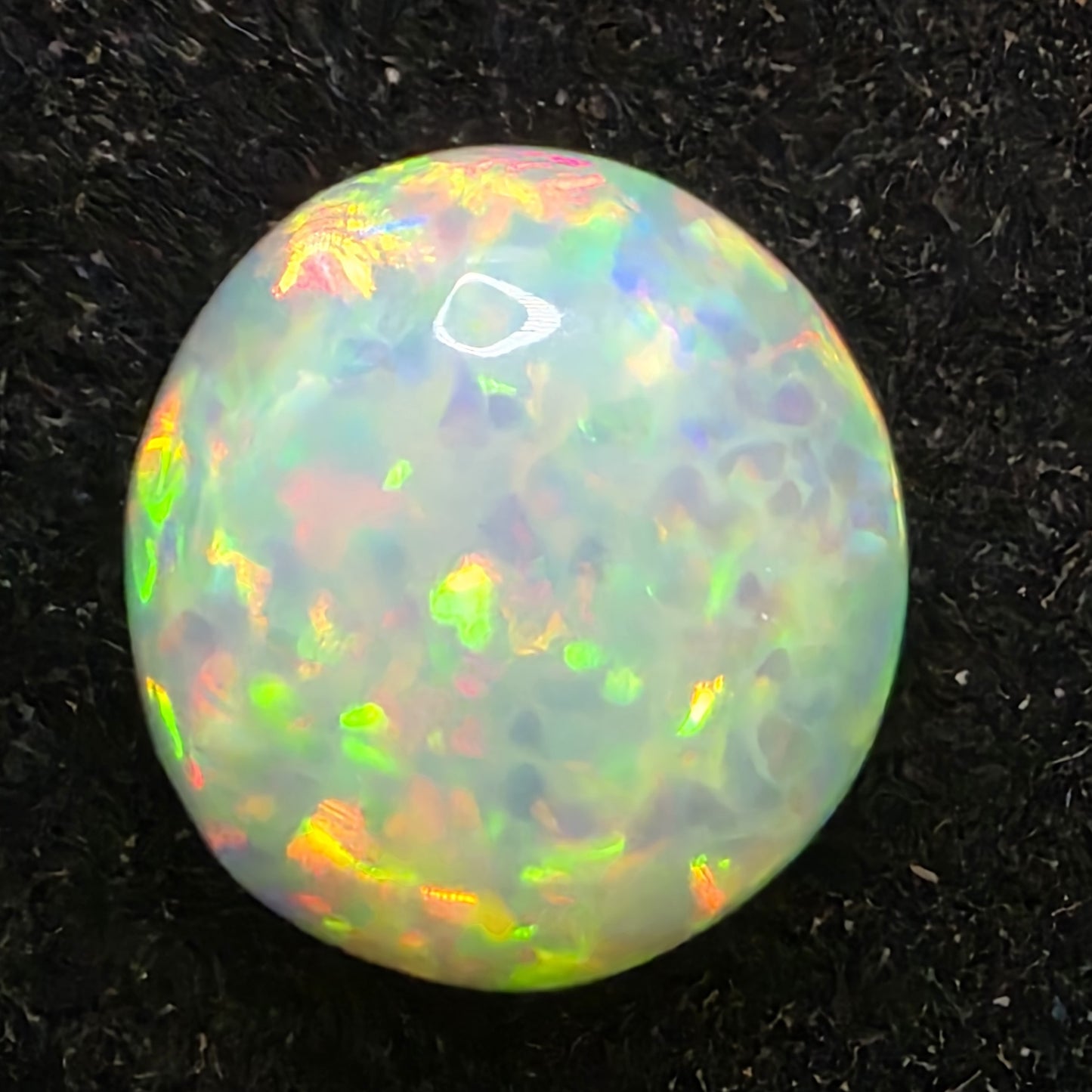 Black Opal special Ethiopian Welo, 2.1 ct round polished, natural, intense Play-of-Colour