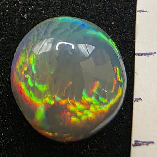 Black Opal special Ethiopian Welo, 5.75 ct round polished, natural, intense Play-of-Colour
