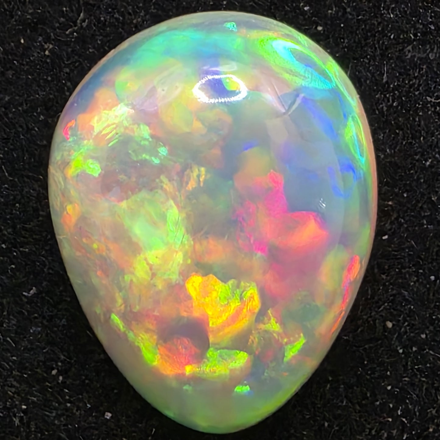 White Opal special Ethiopian Welo, 5.3 ct pear polished, natural, intense Play-of-Colour