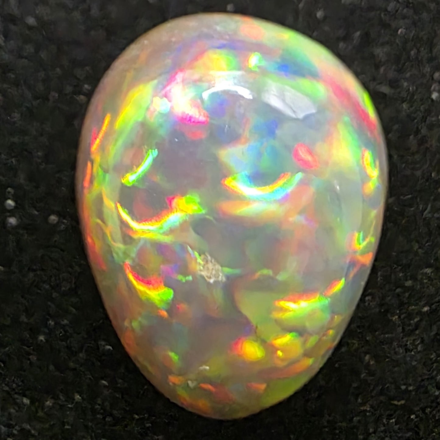 Black Opal special Ethiopian Welo, 6.15 ct pear polished, natural, intense Play-of-Colour