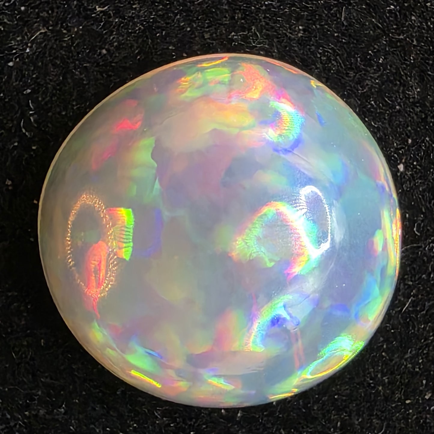 Crystal Opal special Ethiopian Welo, 6.55 ct round polished, natural, intense Play-of-Colour