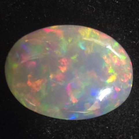 Black Opal special Ethiopian Welo, 6.2 ct oval polished, natural, intense Play-of-Colour