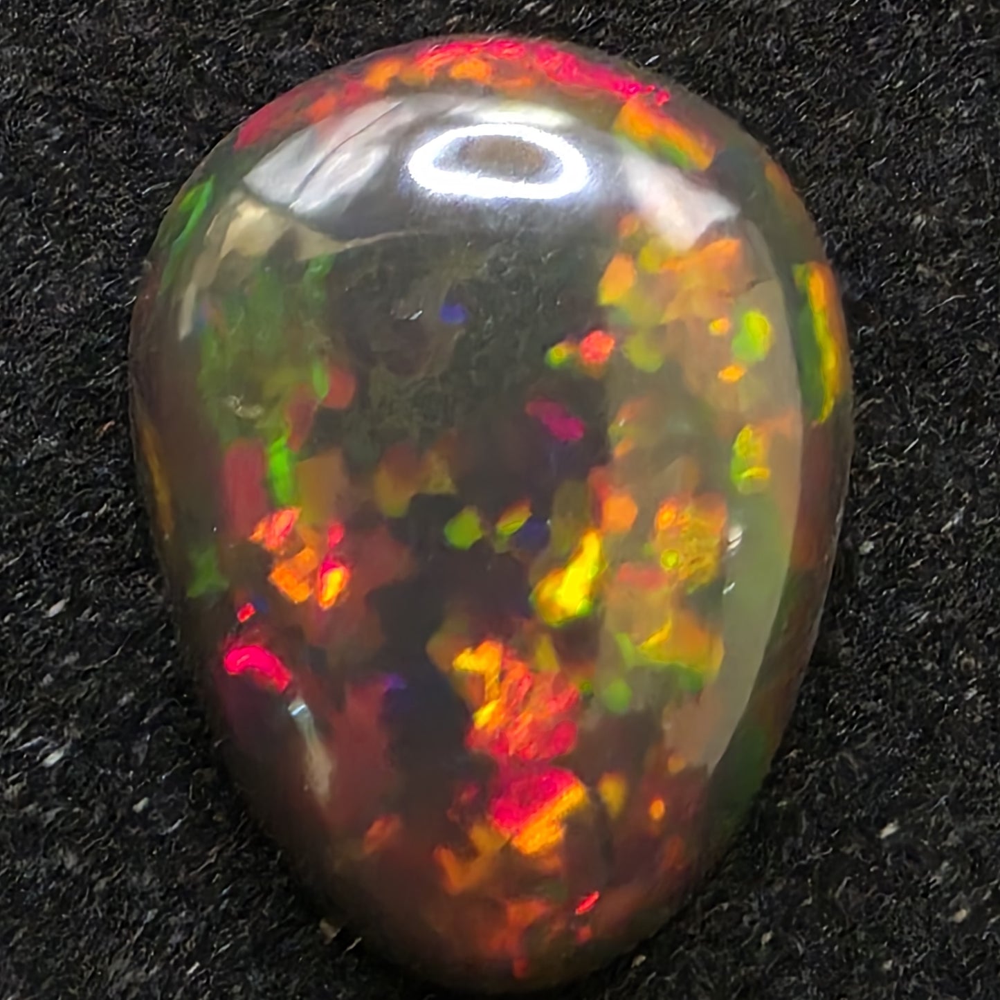 Black Opal special Ethiopian Welo, 5.9 ct pear polished, natural, intense Play-of-Colour