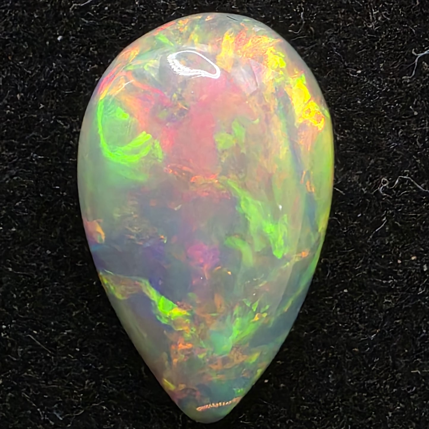 Black Opal special Ethiopian Welo, 4.15 ct pear polished, natural, intense Play-of-Colour