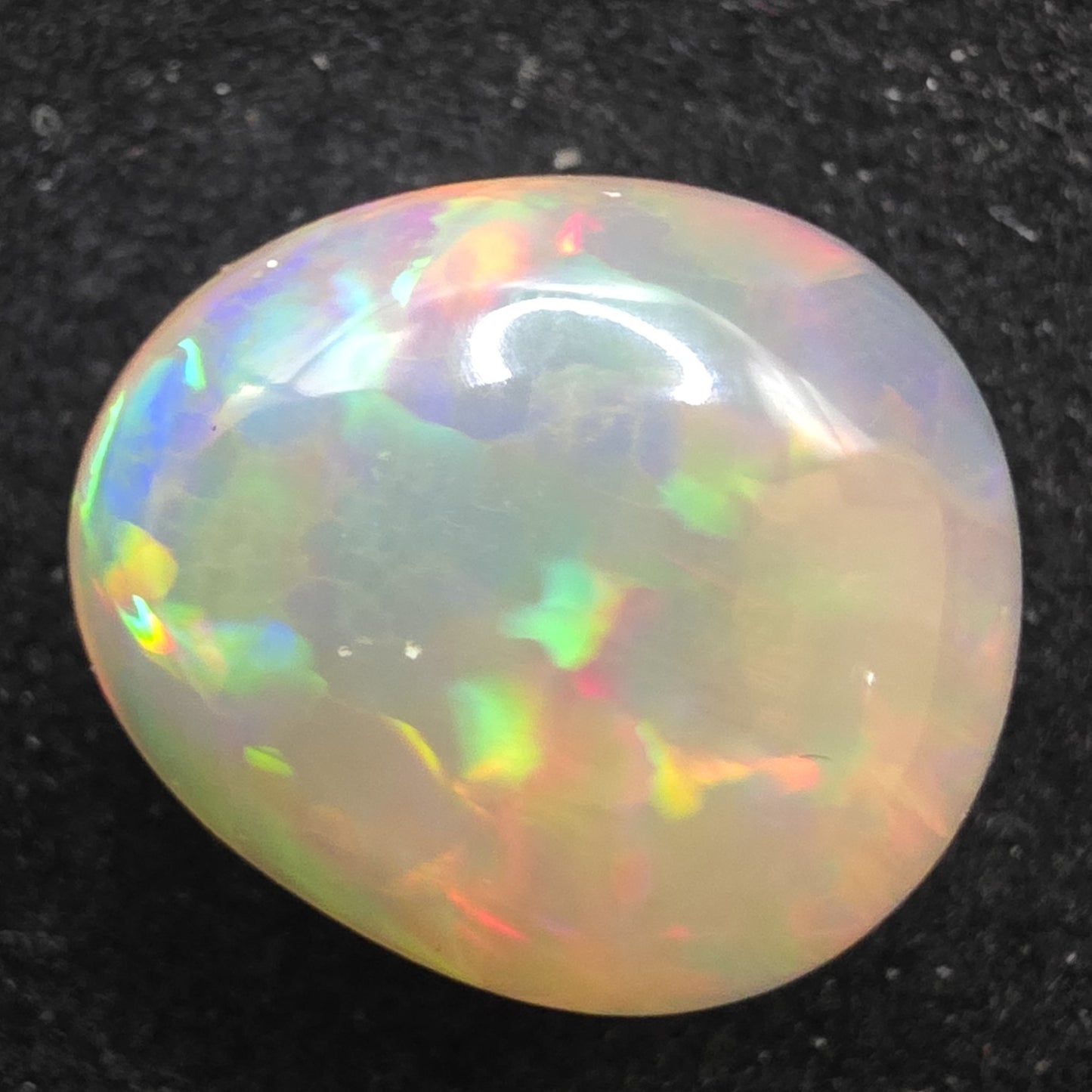 White Opal special Ethiopian Welo, 9.3 ct pear polished, natural, intense Play-of-Colour