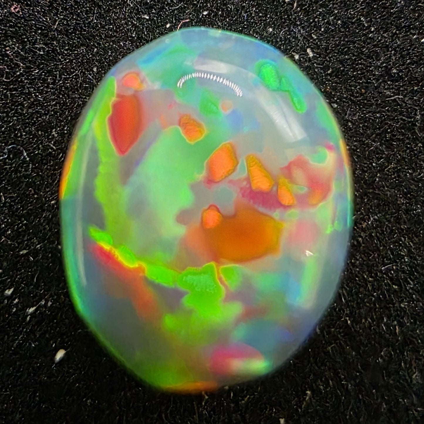 Black Opal special Ethiopian Welo, 1.35 ct oval polished, natural, intense Play-of-Colour