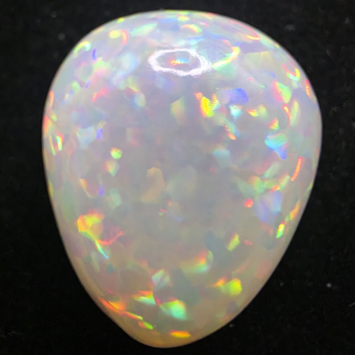 White Opal special Ethiopian Welo, 20.4 ct pear polished, natural, intense Play-of-Colour