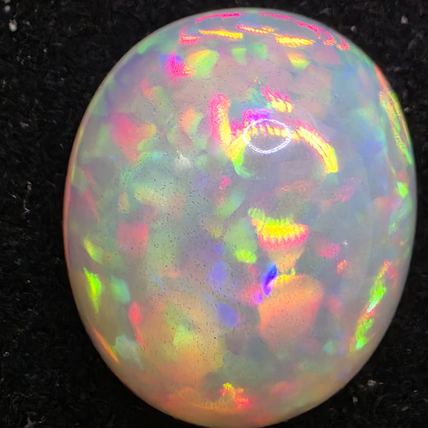 White Opal special Ethiopian Welo, 10.45 ct freeform polished, natural, intense Play-of-Colour
