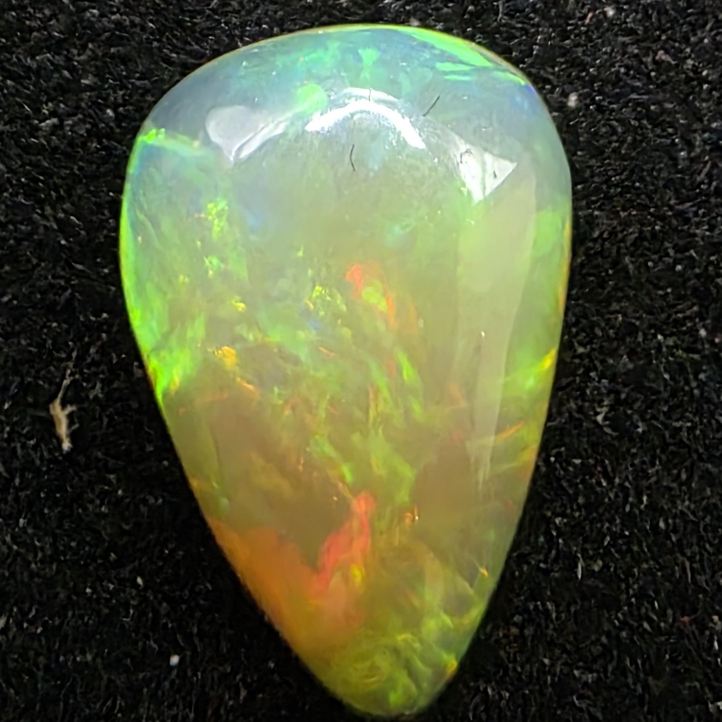 Black Opal Ethiopian Welo, 1.15 ct pear polished, natural