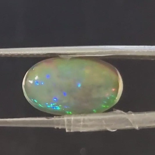 Black Opal special Ethiopian Welo, 2.95 ct oval polished, natural, intense Play-of-Colour